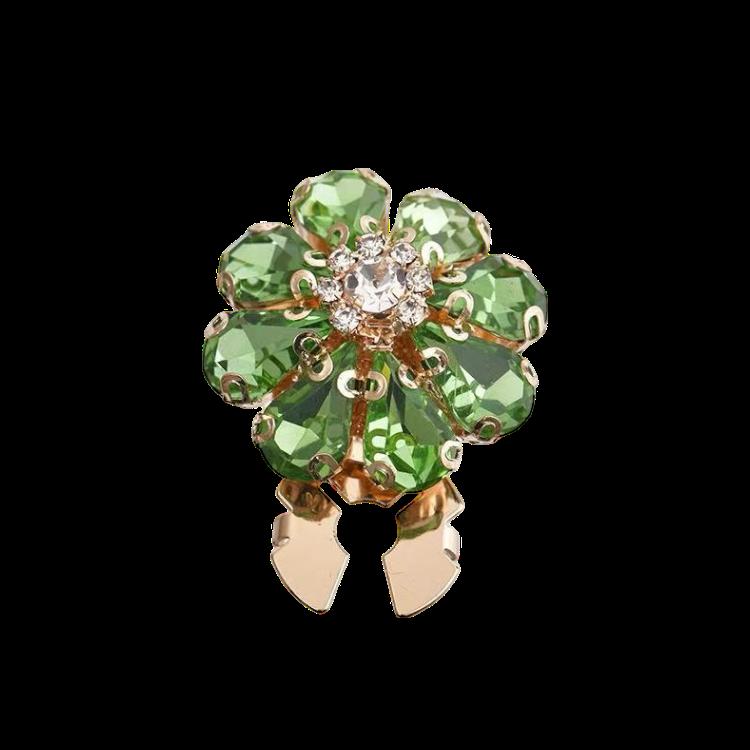 Stor blomst med lysegrønne steiner